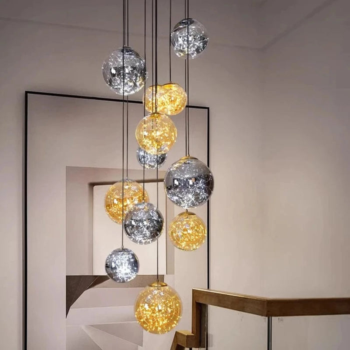 Danny Stairway Lighting Chandelier with glass spheres on a long vertical drop