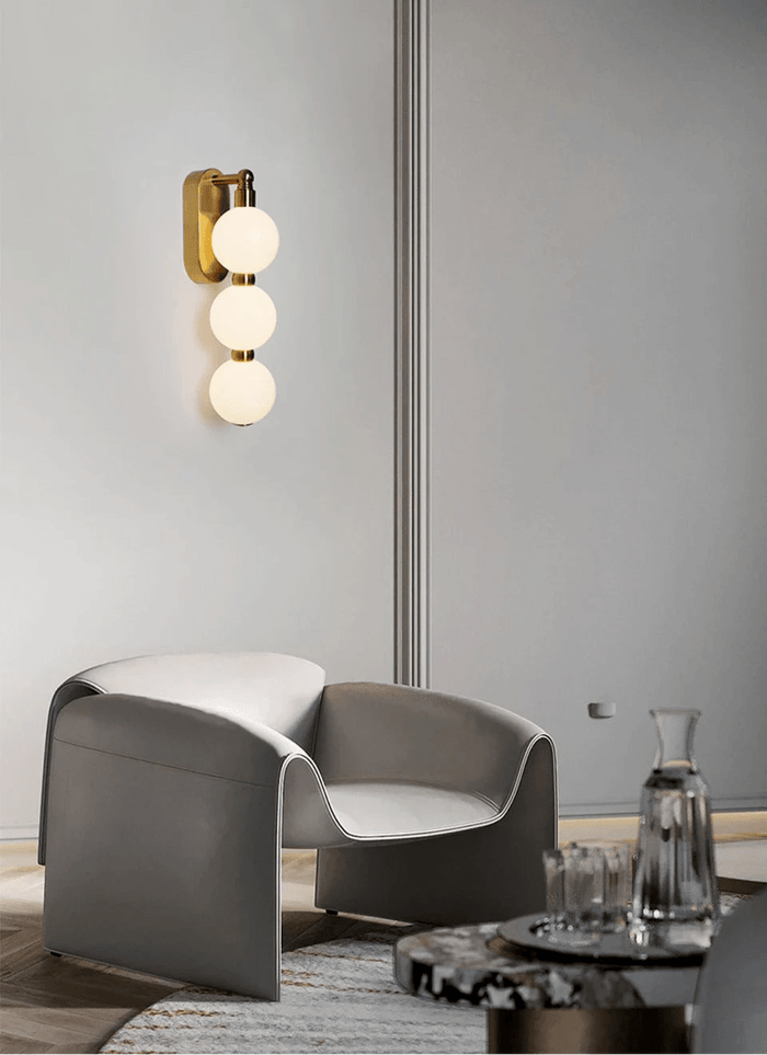 Lyric White Ball Wall Light white globe gold stem minimalist